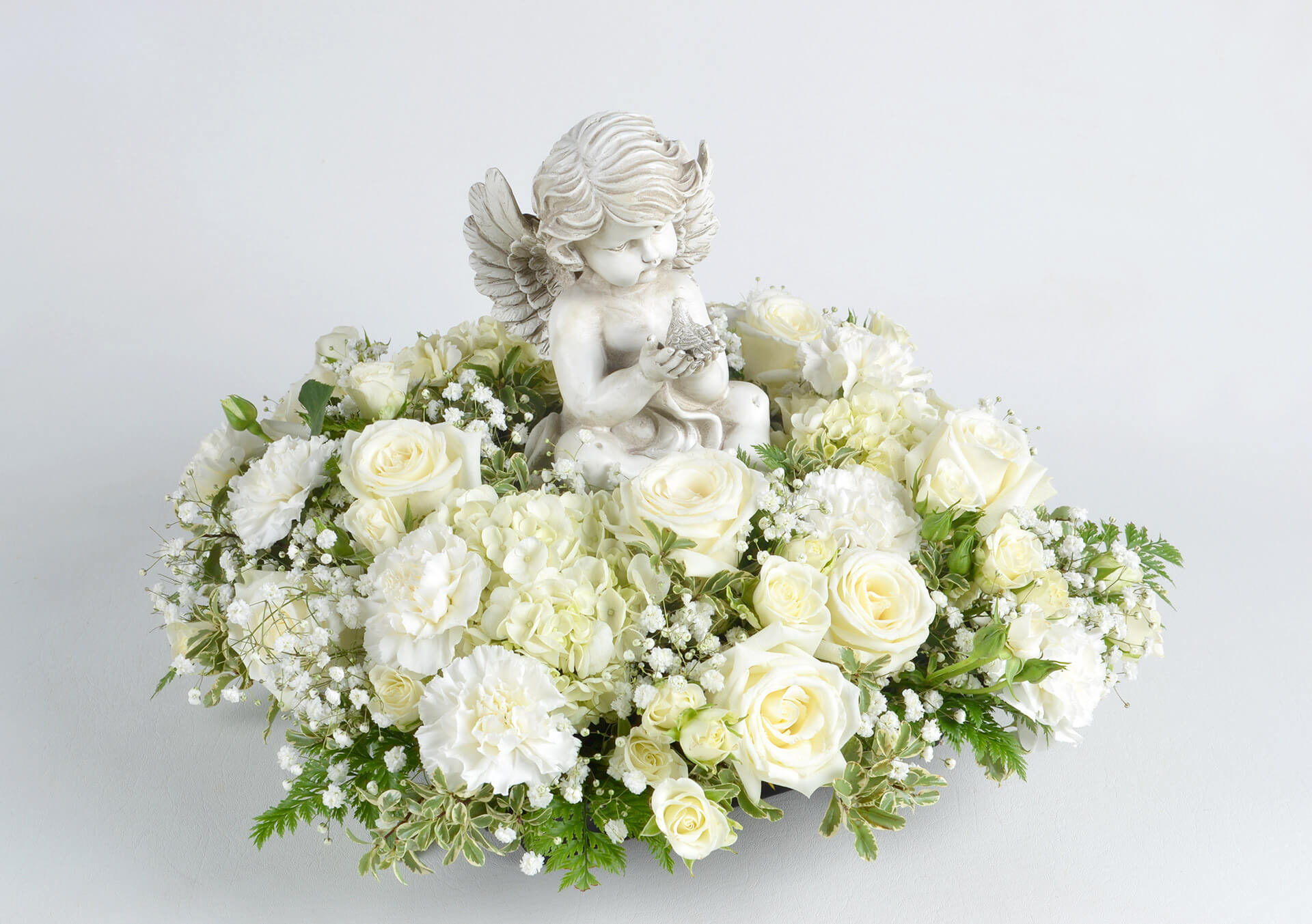 Product Image for Expressions of Sympathy Surrounded By Love Arrangement in White with Angel Holding Bird