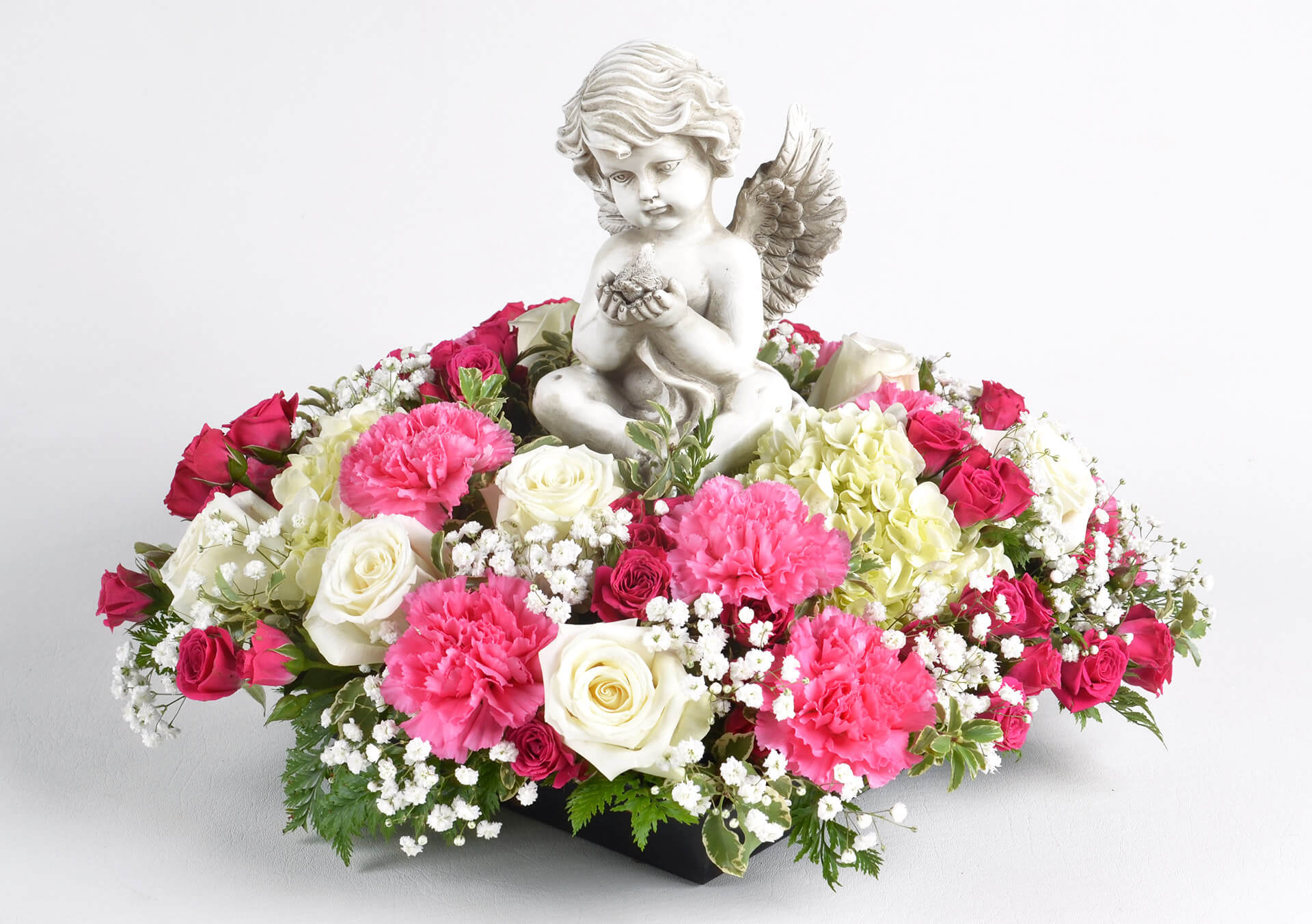 Product Image for Little Angel Surrounded By Love Arrangement in Shades Of Pink with Angel Holding Bird